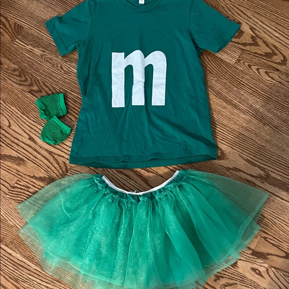Youth L green M&M t-shirt, tutu and mesh gloves.